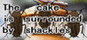 The cake is surrounded by shackles Image